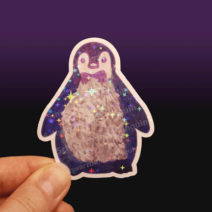 Glitzer Sticker Pinguin Oskar in blau-lila-grau, gemalt mit Acrylfarben.